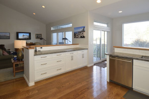 White cabinetry with Brushed Nickel Bow Pulls
